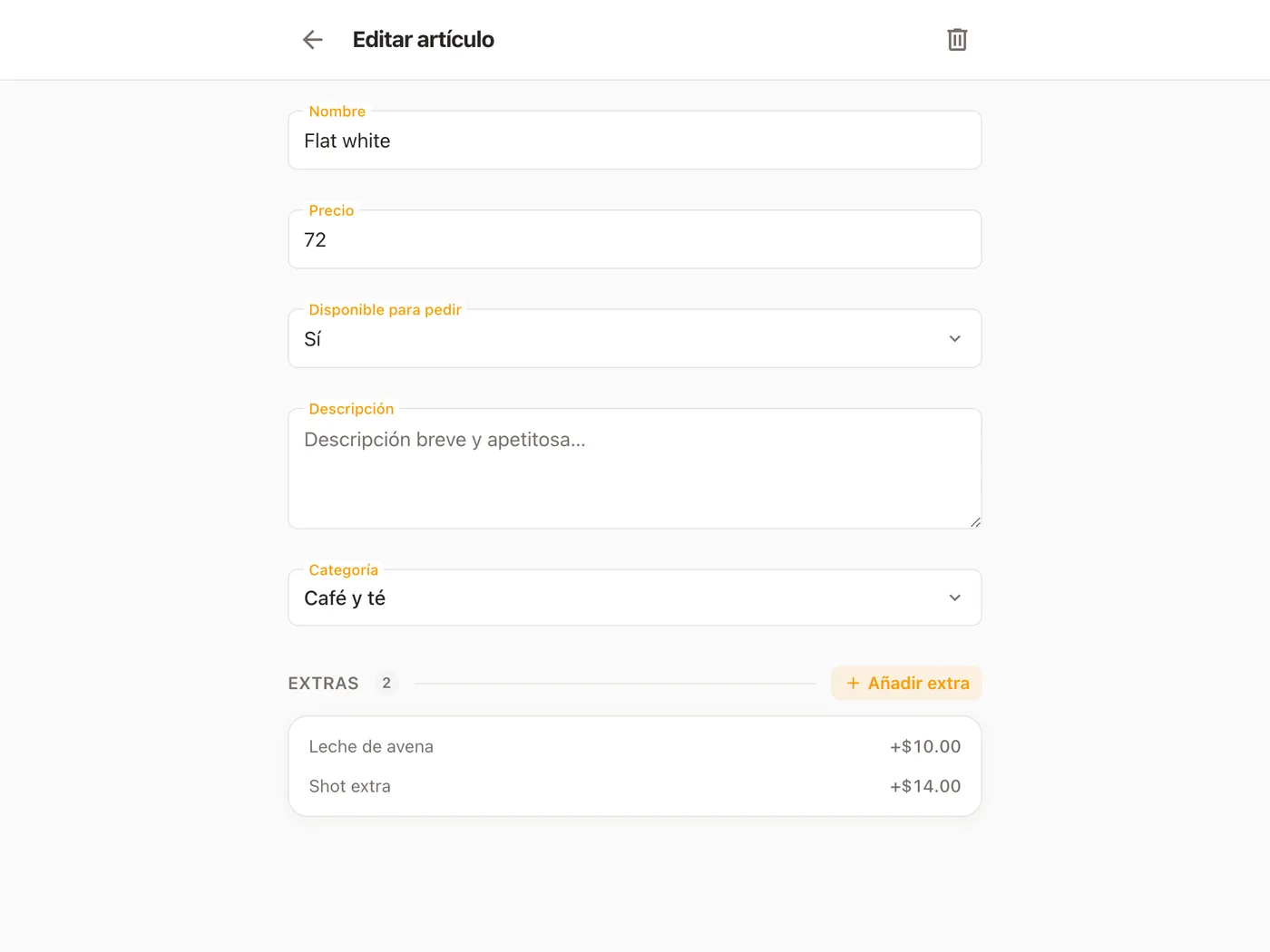 Un artículo abierto en Platevio, en Editar artículo: el nombre y el precio del Flat white, Disponible para pedir en Sí, la descripción vacía, la categoría Café y té y sus dos extras, Leche de avena y Shot extra, con sus precios