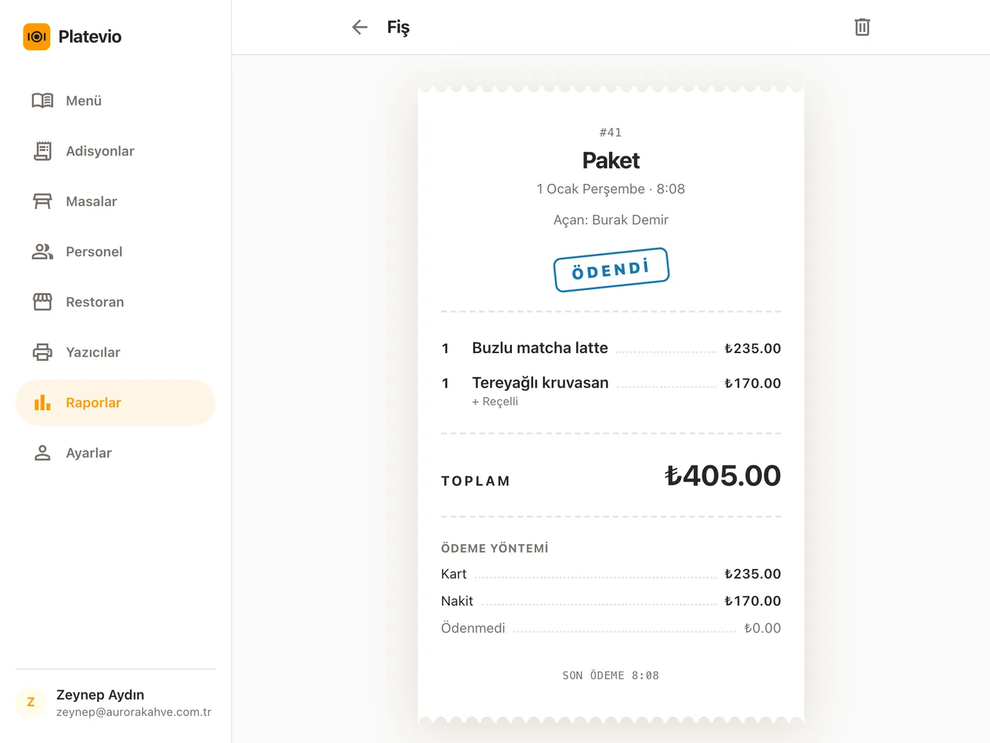Platevio Raporlar’da tek bir adisyonun ayrıntısı: #41, Paket, Açan: Burak Demir ve Ödendi damgası; bir buzlu matcha latte ile reçelli bir tereyağlı kruvasan, toplam ve Ödeme yöntemi altında Kart ve Nakit tutarları